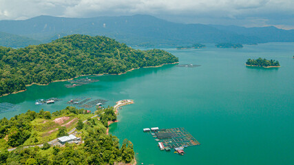 Aerial drone view of Kenyir Lake or Tasik Kenyir which is located at Kuala Berang in Hulu Terengganu, Terengganu, Malaysia