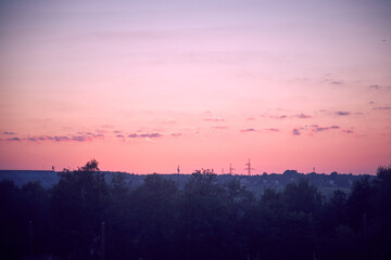 Fototapeta premium a view of a purple sunset in the backcountry