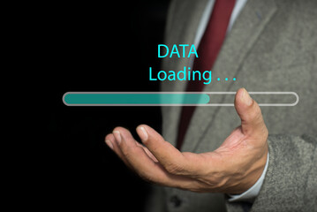Businessman shows the sign of download application and waiting to loading from online server, Upload, download, internet, network. Data loading concept