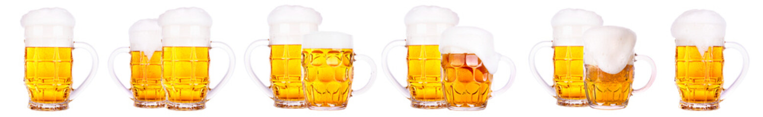Set of fresh beer glasses with bubble froth isolated on white background.