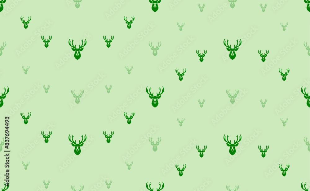 Aufkleber seamless pattern of large and small green deer head symbols. the elements are arranged in a wavy. ve