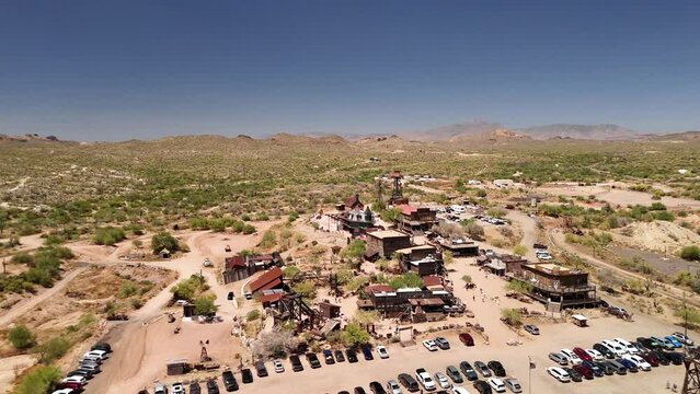 Goldfield Ghost Town in Phoenix Az trucking left aerial drone view.