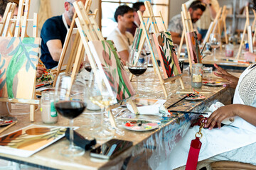 Sip and Paint Event. Social art session with wine and laughter
