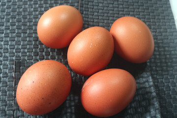 Fresh raw chicken eggs are placed in rows. Cover with tissue and water. in cardboard containers. Chicken eggs are healthy for the body. high nutritional value