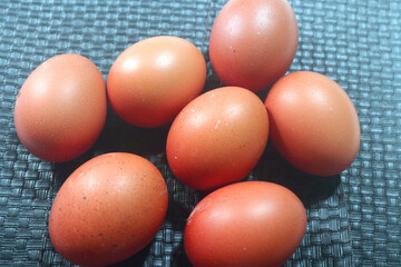Fresh raw chicken eggs are placed in rows. Cover with tissue and water. in cardboard containers. Chicken eggs are healthy for the body. high nutritional value