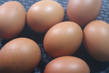 Fresh raw chicken eggs are placed in rows. Cover with tissue and water. in cardboard containers. Chicken eggs are healthy for the body. high nutritional value