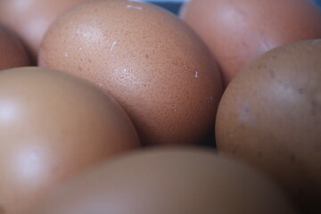Fresh raw chicken eggs are placed in rows. Cover with tissue and water. in cardboard containers. Chicken eggs are healthy for the body. high nutritional value