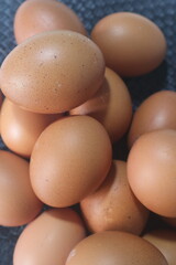 Fresh raw chicken eggs are placed in rows. Cover with tissue and water. in cardboard containers. Chicken eggs are healthy for the body. high nutritional value