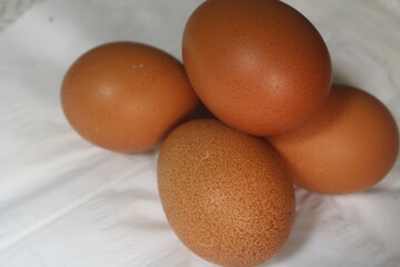 Fresh raw chicken eggs are placed in rows. Cover with tissue and water. in cardboard containers. Chicken eggs are healthy for the body. high nutritional value