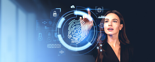 Businesswoman finger touch fingerprint hologram with biometric data icons