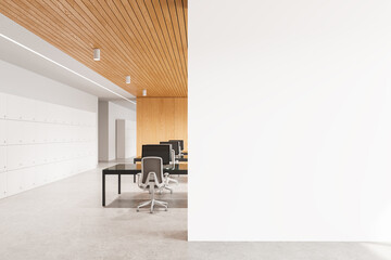 Office space with desks and chairs, wooden ceiling, large white wall, concept of workplace mockup....
