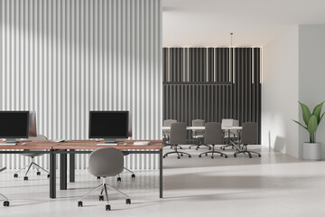 Stylish office interior with coworking and conference board with plant