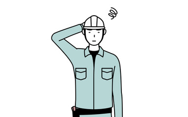 困って頭をかくヘルメットと作業着姿の男性