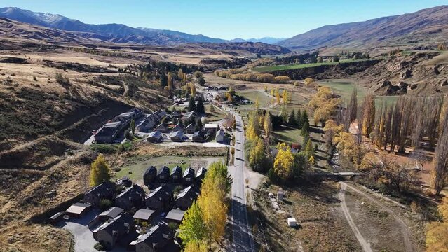 Cardrona Alpine Ski resort town during colourful Autumn, surrounded by New Zealand mountains.