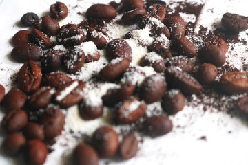 coffee beans. powder. cream. on a white background. the aroma of Sumatran coffee. arabica coffee. civet coffee. expensive and luxurious. drink lover