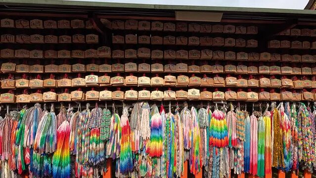 Kyoto, Japan - Prayer Tablets and Tsuru Origami Cranes are Suspended Throughout Fushimi Inari-taisha Shrine - Sideways Shot