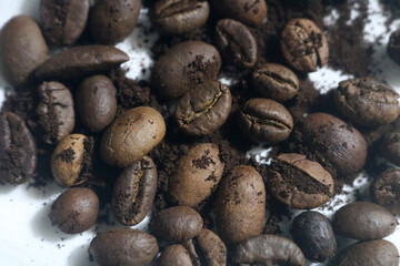 coffee beans. powder. cream. on a white background. the aroma of Sumatran coffee. arabica coffee. civet coffee. expensive and luxurious. drink lover