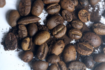 coffee beans. powder. cream. on a white background. the aroma of Sumatran coffee. arabica coffee. civet coffee. expensive and luxurious. drink lover