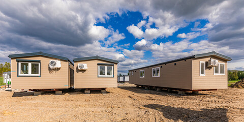Germany, Baden-Wurttemberg, Waiblingen, Clouds over new mobile homes for refugees