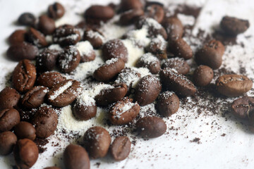coffee beans. powder. cream. on a white background. the aroma of Sumatran coffee. arabica coffee. civet coffee. expensive and luxurious. drink lover