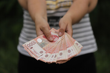 Money in hand, Serbian dinars