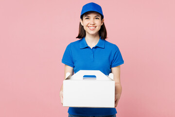 Fun delivery girl employee woman wear blue cap t-shirt uniform workwear work as dealer courier hold...