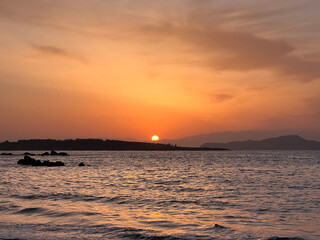 Golden hour sunrise in Chania Crete sun in see romantic