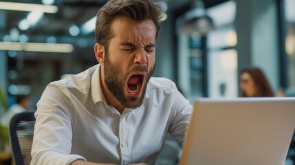 Obraz premium Businessman office worker yawn tired work at laptop mouth open wide sleepy drowsy Caucasian male in white button shirt office