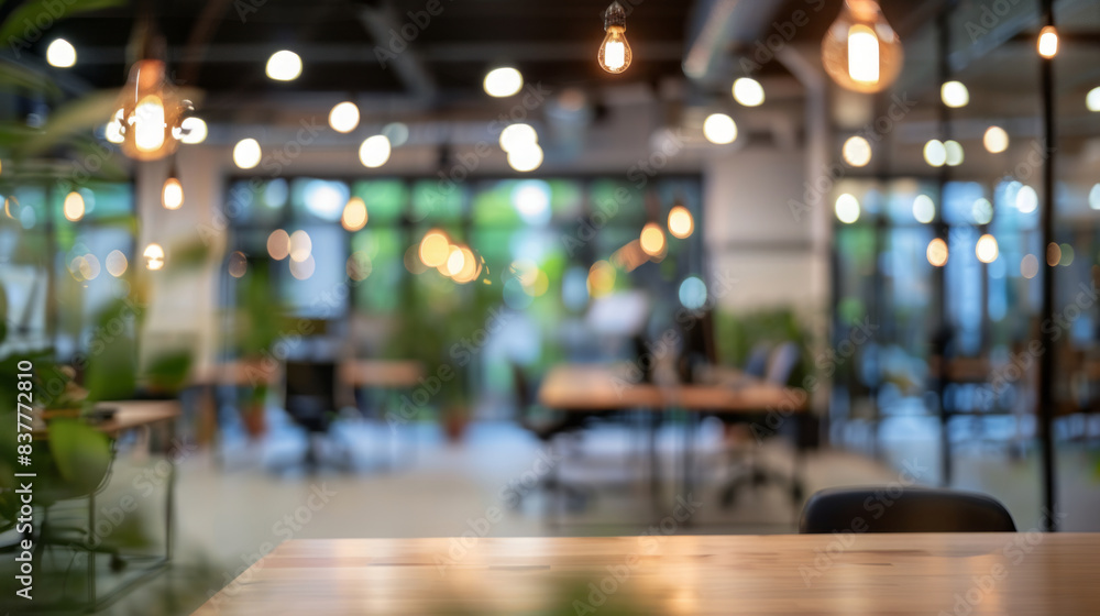 Aufkleber blurred office background with empty desk. modern coworking space with empty desk in focus, blurred 