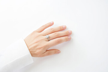 Close-up of Hand Wearing Engagement Ring