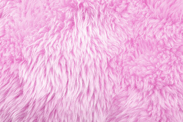 Fototapeta premium Texture of pink faux fur as background, closeup