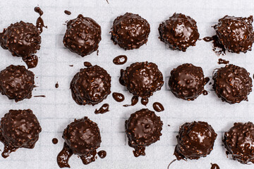 Delicious homemade sweet balls with dark and white chocolate.