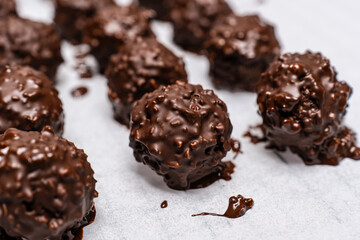 Delicious homemade sweet balls with dark and white chocolate.