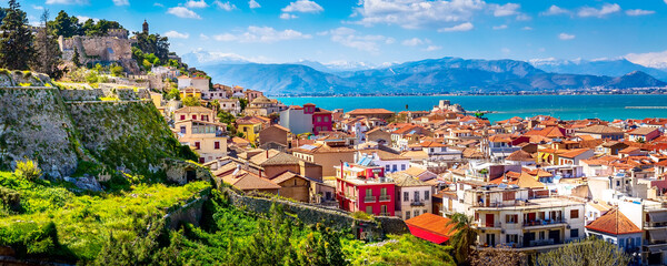 Nafplio, Greece aerial view and snow mountains