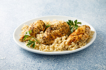 Baked chicken fillet with quinoa and herbs