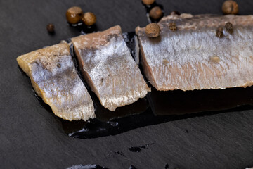 salted herring fillet on the table