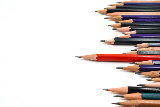 stack of pencils with selective focus on red pencil represent leadership and differentiation concept