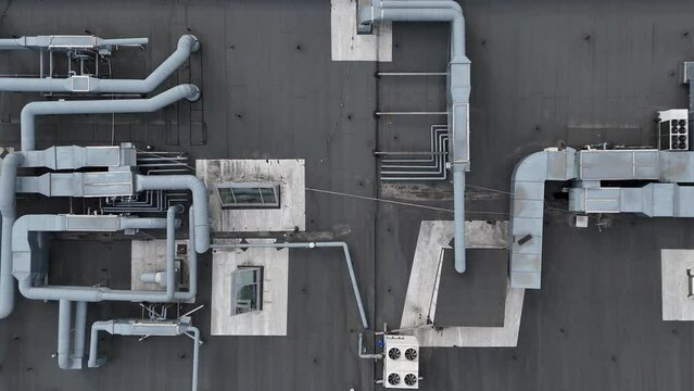 4K Aerial Drone Footage of Industrial Rooftop in Vilnius, Lithuania - Capturing HVAC Systems and Ventilation Equipment from Above