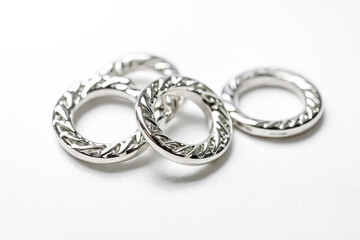 Silver Rings On White Background