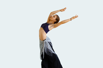 Beautiful young woman dancing oriental belly dance. tribal fusion oriental dances