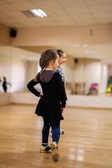 Young Girls Taking Dance Class in Studio with Wooden Floor