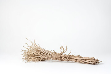 Dry Bundle of Twigs on White Background
