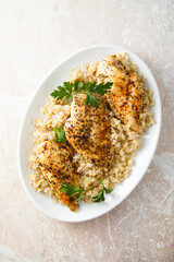 Baked chicken fillet with quinoa and herbs