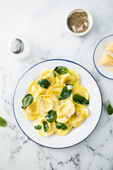 Traditional ravioli with spinach and cream