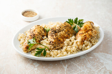 Baked chicken fillet with quinoa and herbs