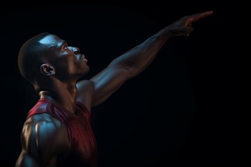 Obraz premium profile of athletic male , arm raised, movement