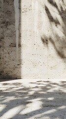 An ivory travertine wall with shadow background for product display