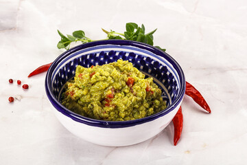 Guacamole with avocado, tomato and chili
