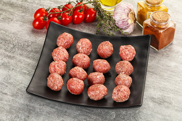 Uncooked raw beef meatball minced