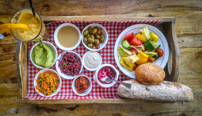 Breakfast is served on a platter and includes healthy and dietary ingredients to start the morning